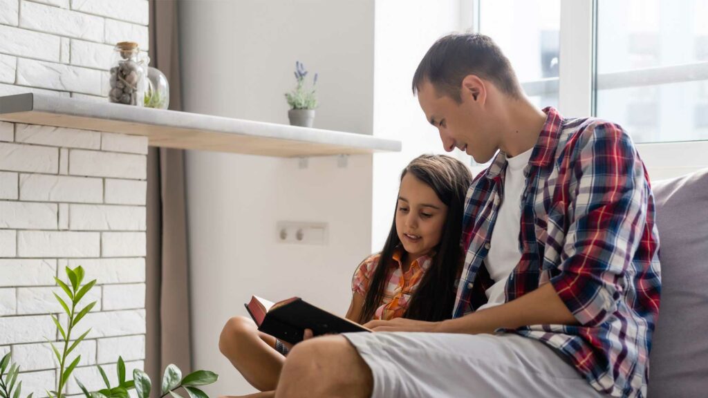 father and child reading