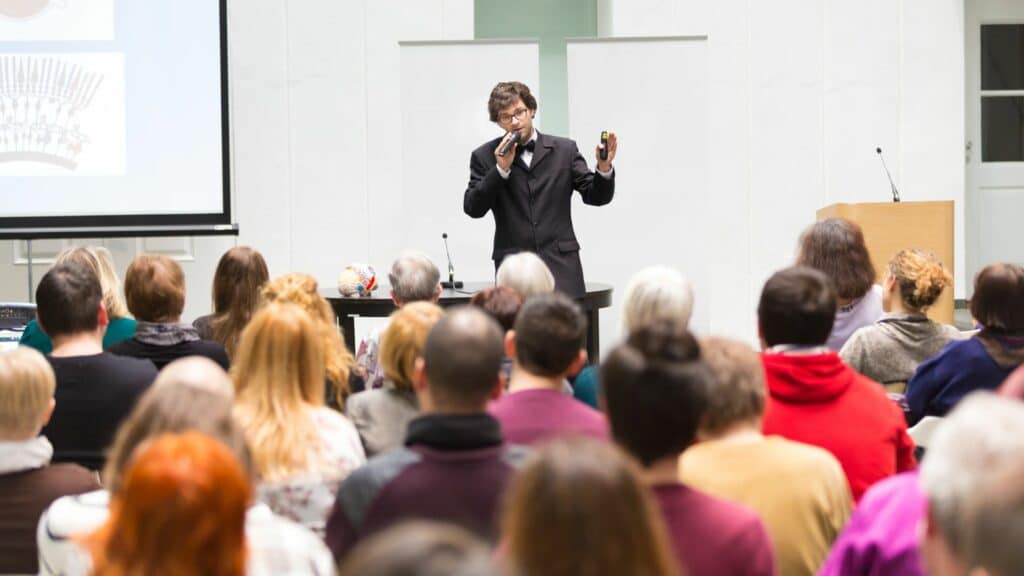 The Secret Power of Storytelling and 2 Ways to Improve Yours 8 Heroes: Man conducting a seminar