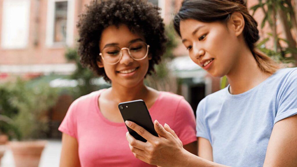 two ladies playing heroes game