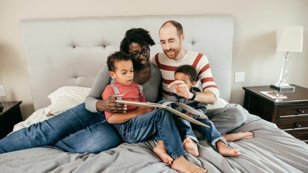 10 Creative Ways to Tell the Story of Esther to Kids 17 Heroes: Child and parents reading a book
