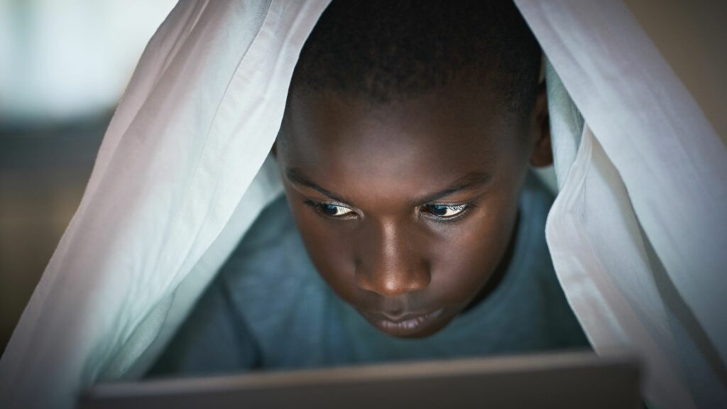 a boy using gadget