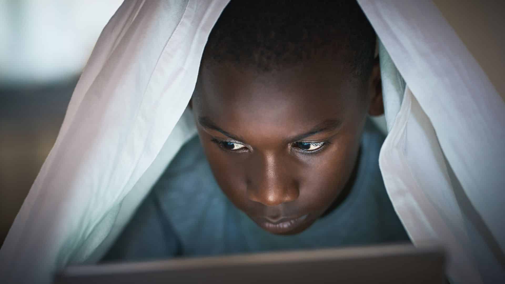 Heroes: a boy using gadget